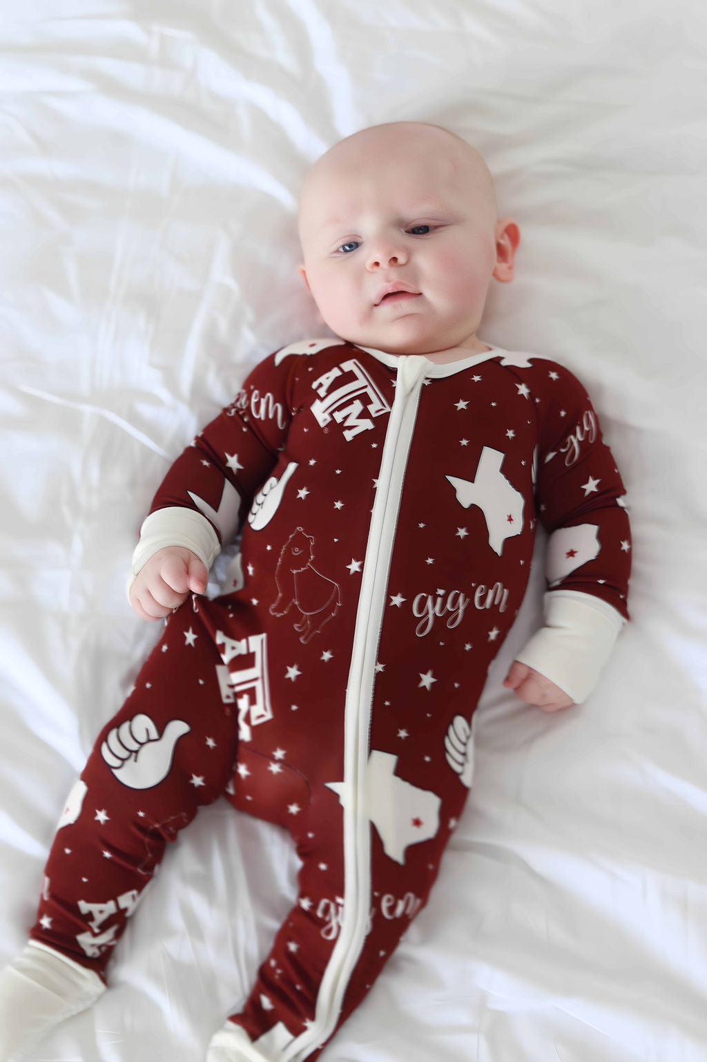 Baby on back in Texas A&M print
