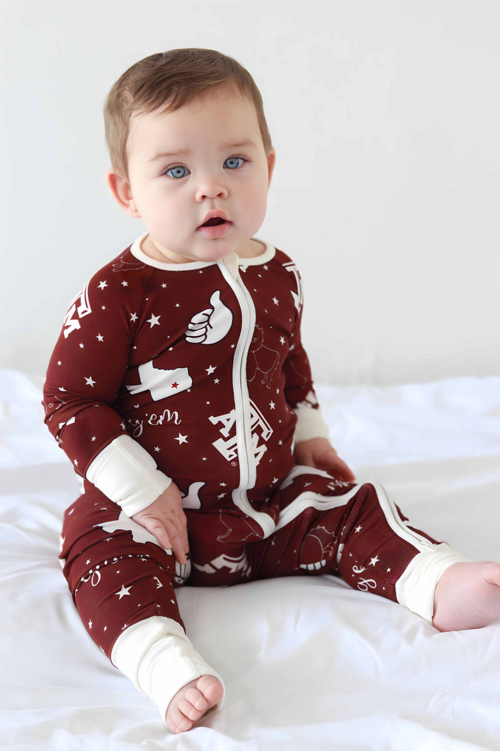 Baby sitting in Texas A&M Print Footie Double Zipper